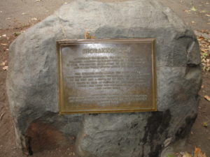 Boulder with plaque commemorating the sale of Manhattan by the Indians to the Dutch